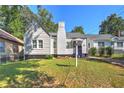 Charming one-story house with a well-maintained lawn at 1581 Linda Sw Way, Atlanta, GA 30310