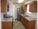 Efficient kitchen boasts updated appliances and bright countertops at 434 Spring Leaf Dr, Dallas, GA 30157