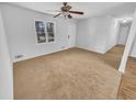 Bright, airy living room space with neutral walls and flooring, ready for personalization at 1963 Suwanee Ter, Lawrenceville, GA 30043