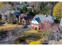 An aerial view of a brick home and neighboring properties at 1366 Emory Ne Rd, Atlanta, GA 30306