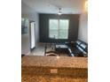 Spacious living room featuring a large sectional sofa and plenty of natural light at 870 Mayson Turner Nw Rd # 1102, Atlanta, GA 30314