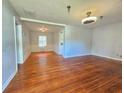 Spacious living room featuring hardwood floors and neutral wall colors at 3801 Orchard Se Rd, Smyrna, GA 30080