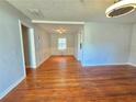 Bright living room with hardwood floors, white walls, and an open layout at 3801 Orchard Se Rd, Smyrna, GA 30080