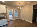 Dining area with hardwood floors and access to the backyard at 2259 Old Yorkville Rd, Dallas, GA 30157