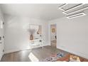 Light-filled entryway with a console table and view to the living room at 3611 Hillsborough Ln, Decatur, GA 30032