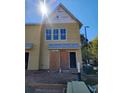 New construction exterior with fiber cement siding, professionally landscaped homesite, and exterior designs at 1095 Tucker Ave # 208, Atlanta, GA 30310