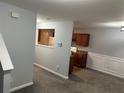 Spacious living room with fireplace and neutral carpeting at 2805 Vining Ridge Ter, Decatur, GA 30034