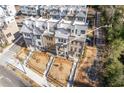 Aerial view showcases townhome community and surrounding landscape at 1788 Peach Blossom Ne Ln # 45, Atlanta, GA 30324