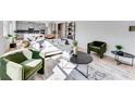 Bright and airy living room with modern decor and large windows at 93 Sheryl Way, Loganville, GA 30052
