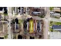 An aerial shot depicts the location of a vacant lot, showcasing its proximity to nearby streets and buildings at 133 Haygood Se Ave, Atlanta, GA 30315