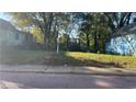 A vacant lot is ready for development, surrounded by mature trees in an established neighborhood at 133 Haygood Se Ave, Atlanta, GA 30315