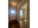 Bright foyer with hardwood floors and an inviting entryway at 273 Lakeside Pl, Canton, GA 30114