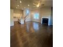 Spacious living room with hardwood floors, fireplace, and natural light at 273 Lakeside Pl, Canton, GA 30114
