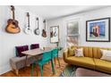 Living room with hardwood floors, eclectic decor, and a comfortable seating area at 764 Edgewood Ne Ave # 1, Atlanta, GA 30307