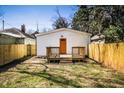 Private backyard with a wooden deck and fenced enclosure at 1110 Mcdaniel Sw St, Atlanta, GA 30310