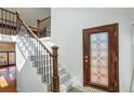 Bright entryway with staircase and elegant door at 1801 Laurel Creek Se Trl, Smyrna, GA 30080
