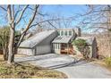 Two-story house with stone accents and attached garage at 1801 Laurel Creek Se Trl, Smyrna, GA 30080