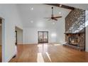 Spacious living room with hardwood floors and stone fireplace at 1801 Laurel Creek Se Trl, Smyrna, GA 30080