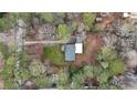 Aerial view of a home surrounded by lush greenery, offering privacy at 589 Northern Ave, Clarkston, GA 30021
