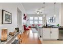 Open-concept living space with combined kitchen, dining, and sitting areas, creating a seamless flow at 3621 Vinings Slope Se # 1537, Atlanta, GA 30339