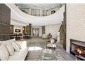 Modern resident lounge with ample seating, a fireplace, and a snack area at 3621 Vinings Slope Se # 1537, Atlanta, GA 30339
