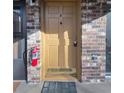 Unit F front door with brick surround, and safety features at 1177 Church St # F, Decatur, GA 30030