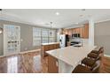 Eat-in kitchen with hardwood floors and access to a deck at 2853 Brandl Cove Ct # 1, Marietta, GA 30067