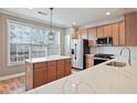 Modern kitchen with stainless steel appliances and a large island at 2853 Brandl Cove Ct # 1, Marietta, GA 30067