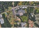 Aerial view of property location, near shopping, recreation, and schools, with easy access to nearby streets at 10561 E Cherokee Dr, Canton, GA 30115