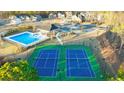 Community amenities include tennis courts and a swimming pool at 583 Princeton Elm Pl, Lawrenceville, GA 30045