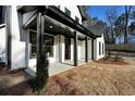 Inviting front porch with stylish columns and manicured landscaping at 3785 Pilgrim Mill Rd, Cumming, GA 30041