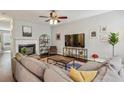 Spacious living room featuring a fireplace and ample natural light at 3819 Chattahoochee Summit Se Dr, Atlanta, GA 30339