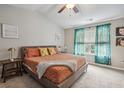 Bright main bedroom with high ceilings and large windows at 3819 Chattahoochee Summit Se Dr, Atlanta, GA 30339