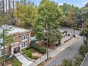Brick apartment building viewed from above, with street and neighborhood views showing the property's setting at 242 12Th Ne St # 14, Atlanta, GA 30309