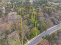 Aerial view of wooded property showcasing the lot's boundaries and mature trees at 5655 Campbellton Sw Rd, Atlanta, GA 30331