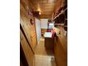 Rustic bathroom features wood paneling and charming Coca-Cola decor throughout at 745 Shiloh Nw Rd, Kennesaw, GA 30144