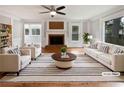 Bright living room with a fireplace, hardwood floors and great natural light at 3549 Meadow Chase Dr, Marietta, GA 30062