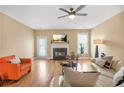 Living room with hardwood floors, fireplace and plenty of natural light at 5030 Bayrose Cir # 30A, Atlanta, GA 30344