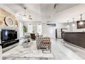 Open floor plan showcases the living room and kitchen with seamless transitions at 5483 Wylstream, Norcross, GA 30093