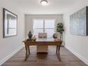 Bright home office with a large window and modern decor, perfect for remote work at 1341 Cedarcrest Blvd, Acworth, GA 30101