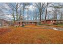 Charming brick home featuring a walkway and a covered carport at 1350 Ruth, Decatur, GA 30035