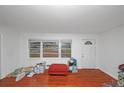 Cozy living room with hardwood floors and abundant natural light at 1350 Ruth, Decatur, GA 30035