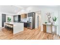 Modern kitchen with large island, stainless steel appliances, and white quartz countertops at 2649 Sunrise Ne Dr, Atlanta, GA 30345