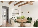 Cozy dining nook with green upholstered seating and stylish decor at 10939 Serenbe Ln, Chattahoochee Hills, GA 30268