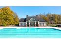 Community pool with clubhouse; inviting and refreshing at 13538 Whitman Ln, Covington, GA 30014