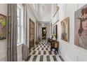 Grand entry hall with geometric tile floor and artwork at 3488 Tuxedo Nw Rd, Atlanta, GA 30305