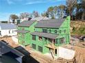 Two houses under construction viewed from above at 1200 Lupo Loop, Chattahoochee Hills, GA 30268