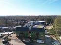 Aerial view of two homes under construction in a neighborhood at 1200 Lupo Loop, Chattahoochee Hills, GA 30268
