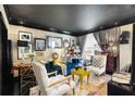 Chic living room with dark ceilings and eclectic decor at 1421 Peachtree Ne St # 203, Atlanta, GA 30309