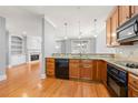 Modern kitchen with wood cabinets and hardwood floors at 4950 Ivy Ridge Se Dr # 105, Atlanta, GA 30339